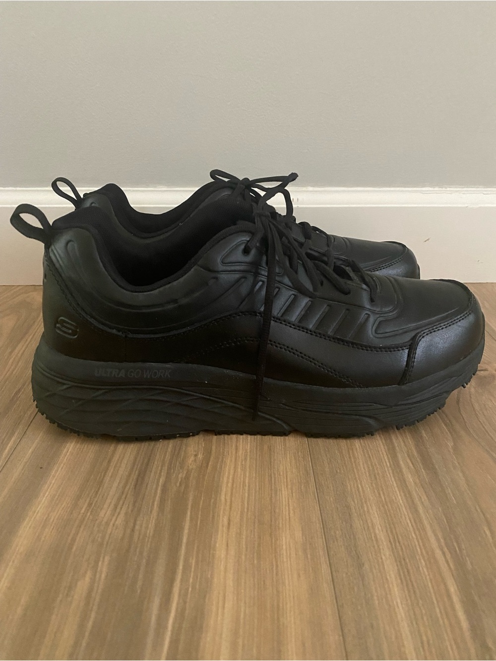 Skechers Men’s 12 Ultra Go slip resistant work shoes Black